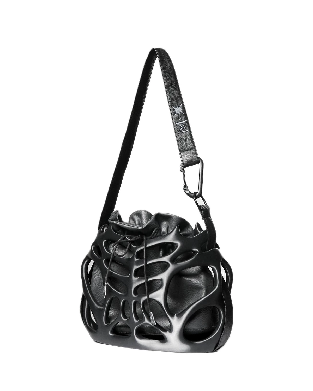 Nico Ribcage Sac: black 3D-printed ribcage on a shoulder strap with a carabiner.