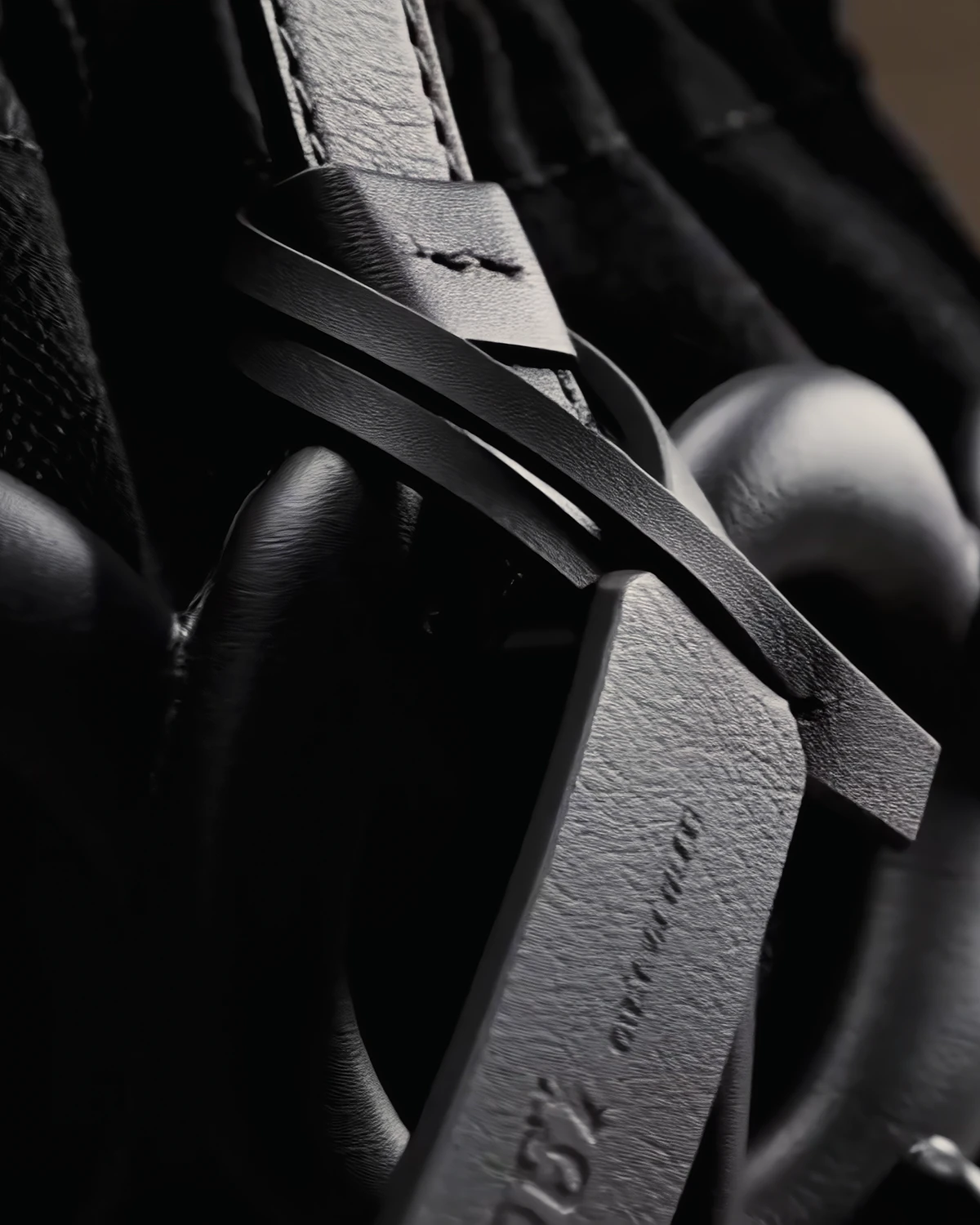 Close view of the leather tag looped through the lattice.